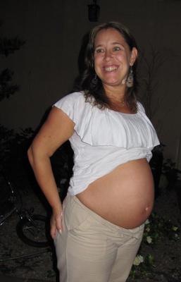 Pregnant wife exposes her big belly