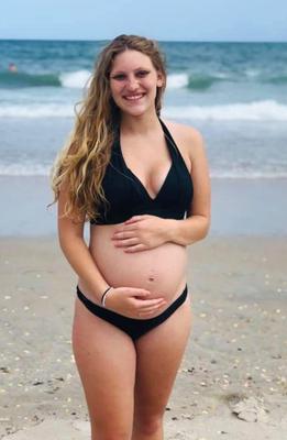 Pregnant yo young blonde mom